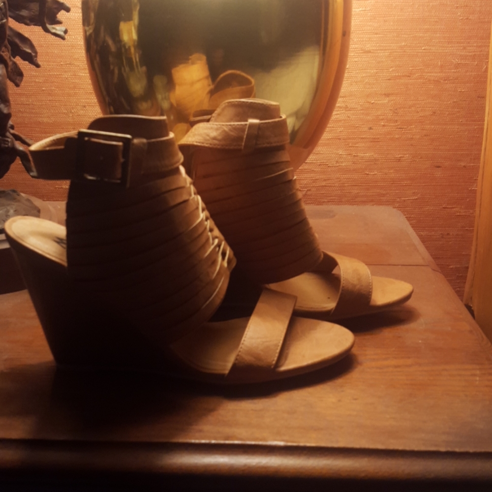 New, never worn brown leather strap wedges
